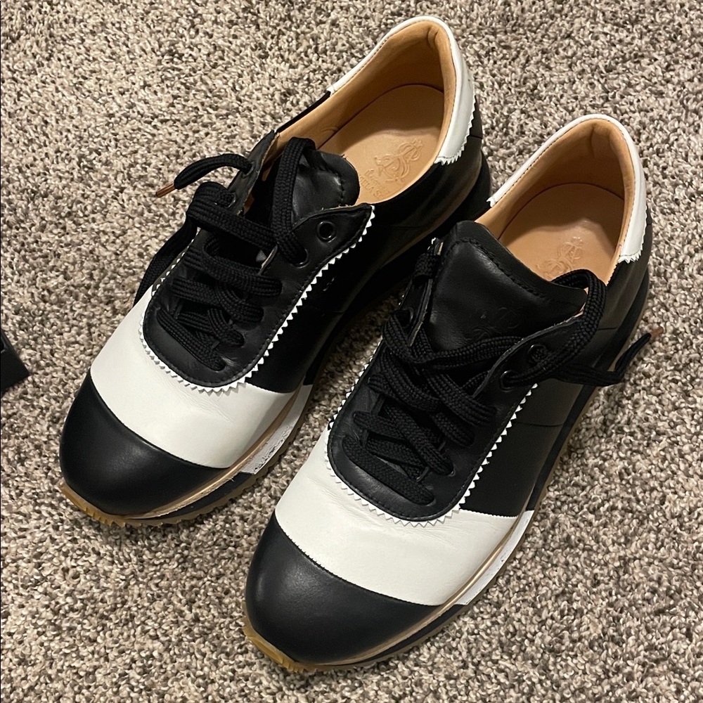 Stylish Black and White women’s Sneakers- The office of Angela Scott.